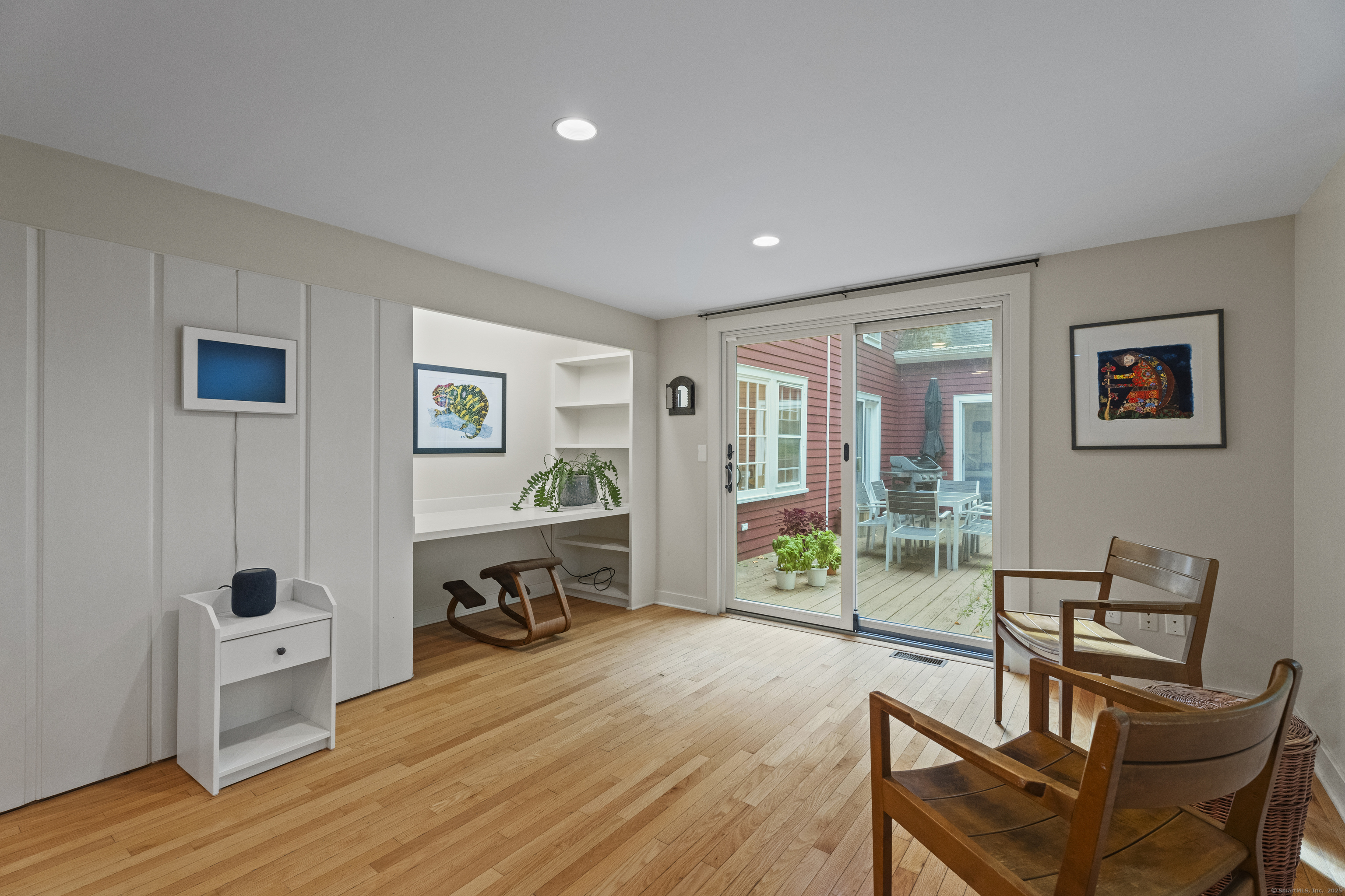 133 Blake Road Hamden, CT 06517 - Photo 15 of 40 a living room with furniture and a wooden floor