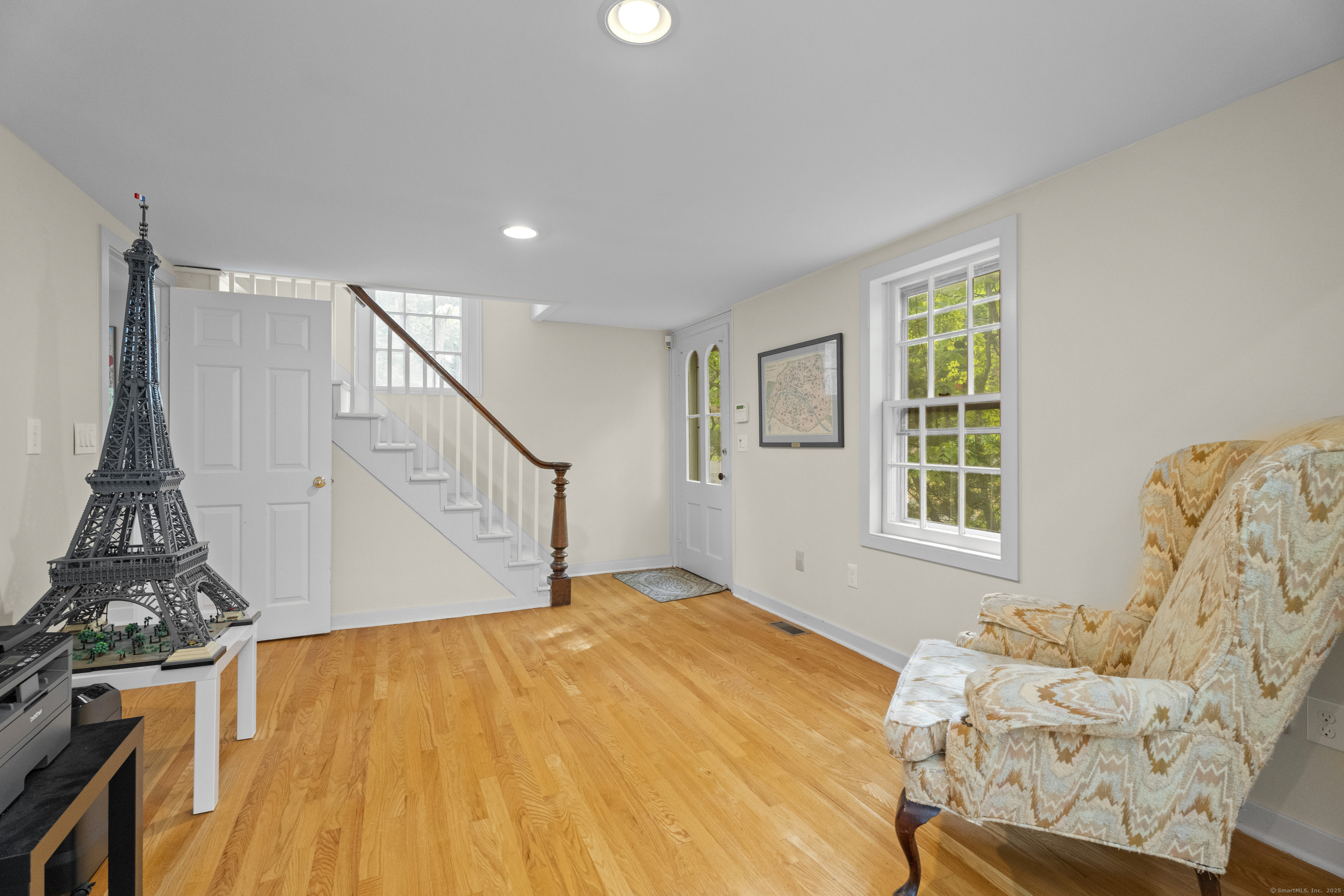 133 Blake Road Hamden, CT 06517 - Photo 17 of 40 a view of a livingroom with furniture wooden floor and windows