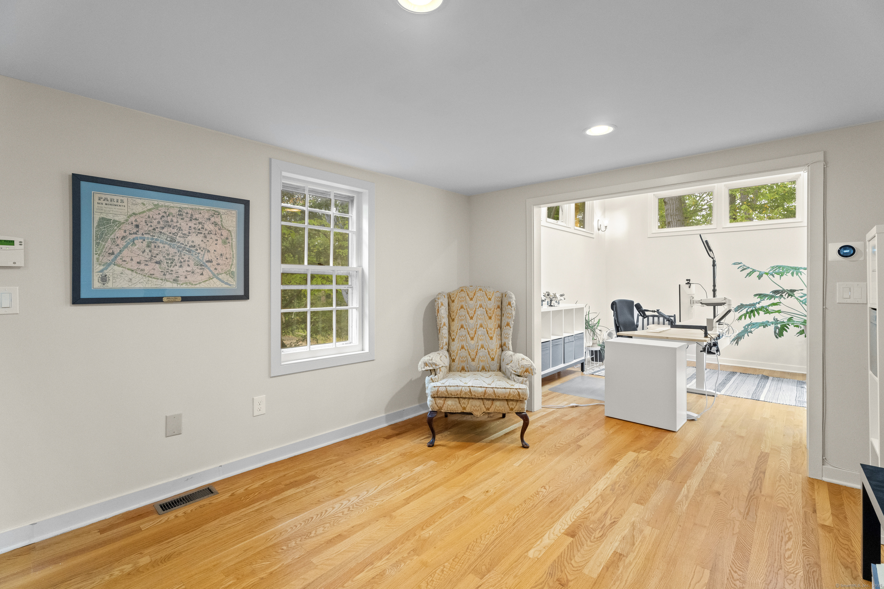 133 Blake Road Hamden, CT 06517 - Photo 18 of 40 a living room with furniture and a wooden floor