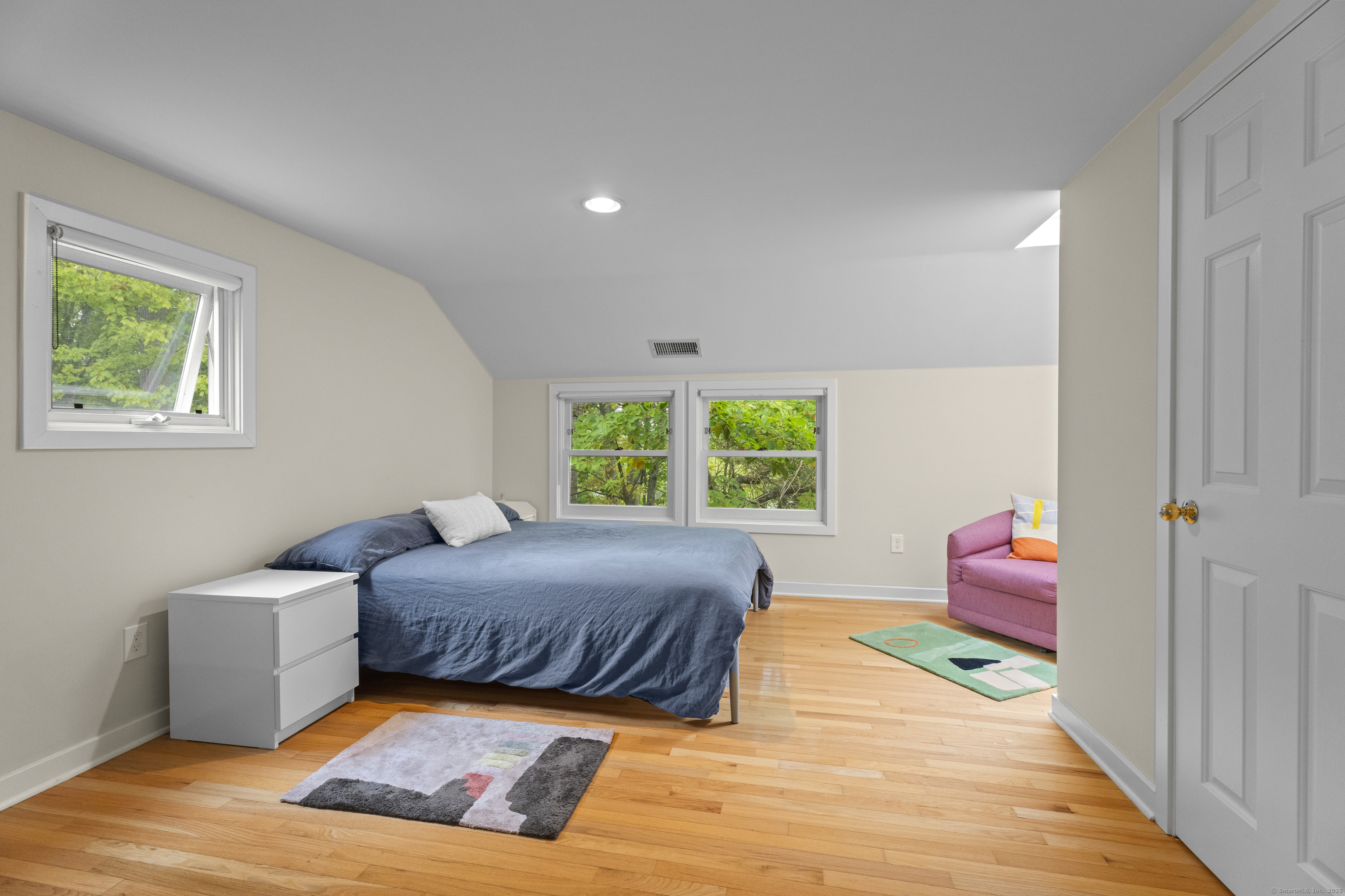 133 Blake Road Hamden, CT 06517 - Photo 26 of 40 a bedroom with a bed and a couch