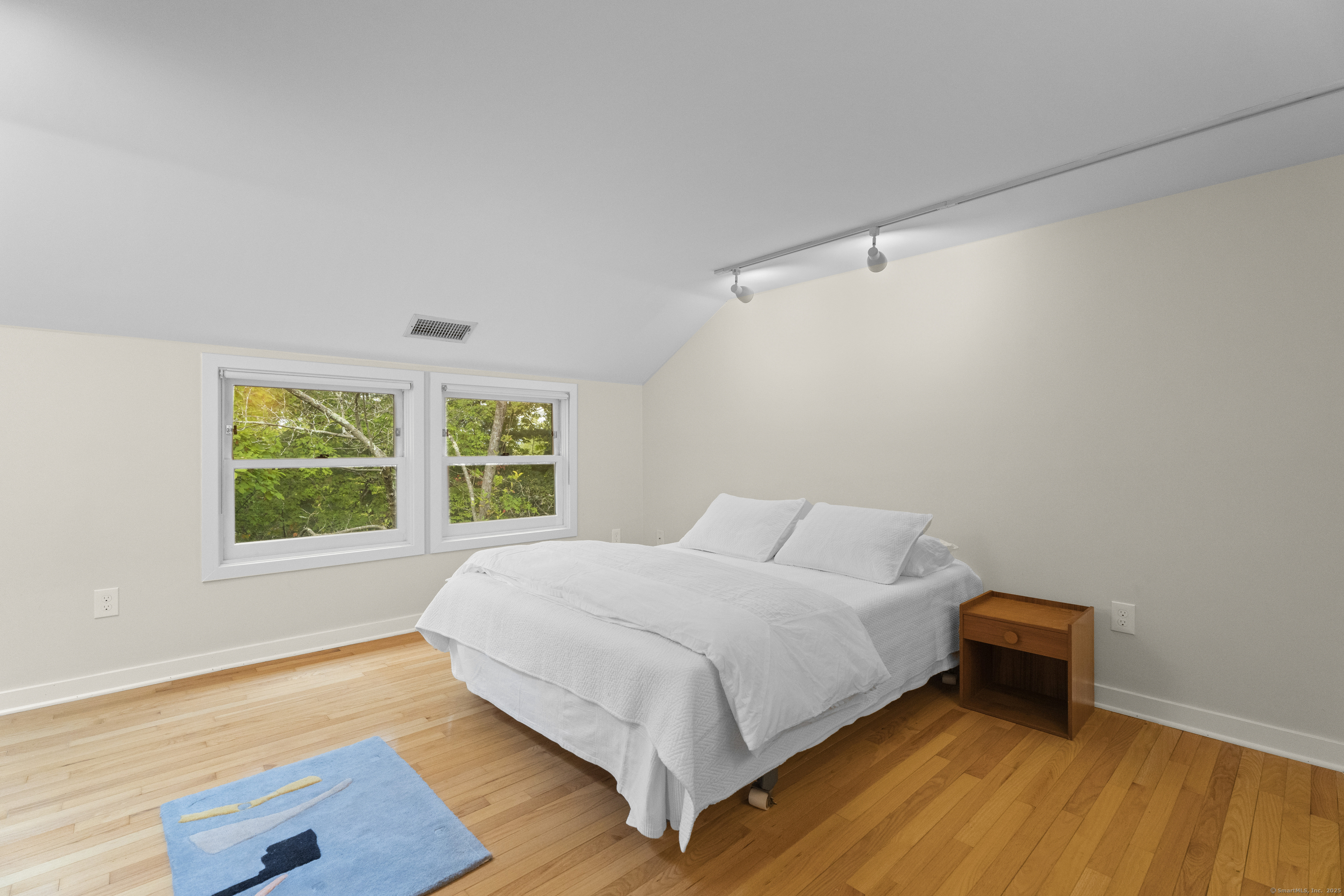 133 Blake Road Hamden, CT 06517 - Photo 28 of 40 a bedroom with a bed and window