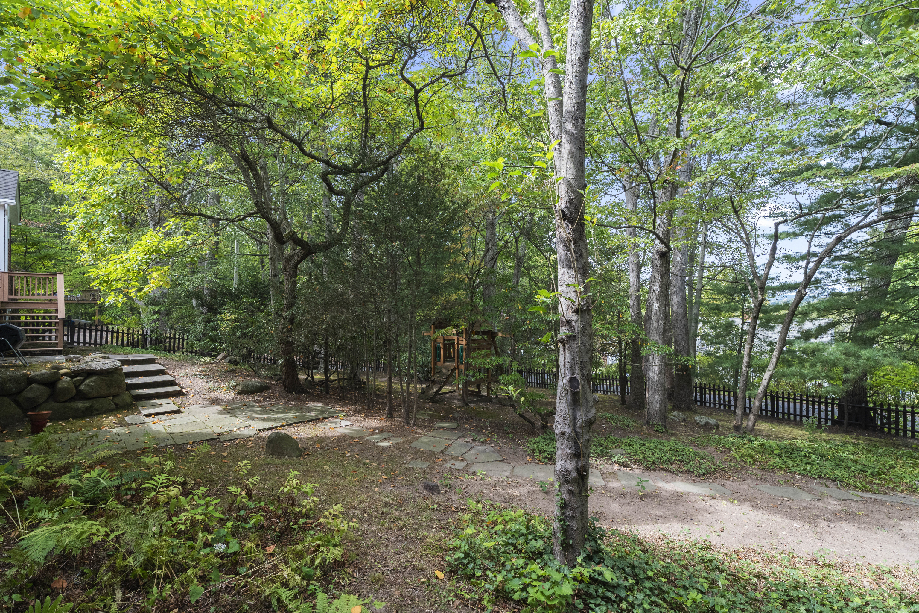 133 Blake Road Hamden, CT 06517 - Photo 36 of 40 a view of a park that has large trees