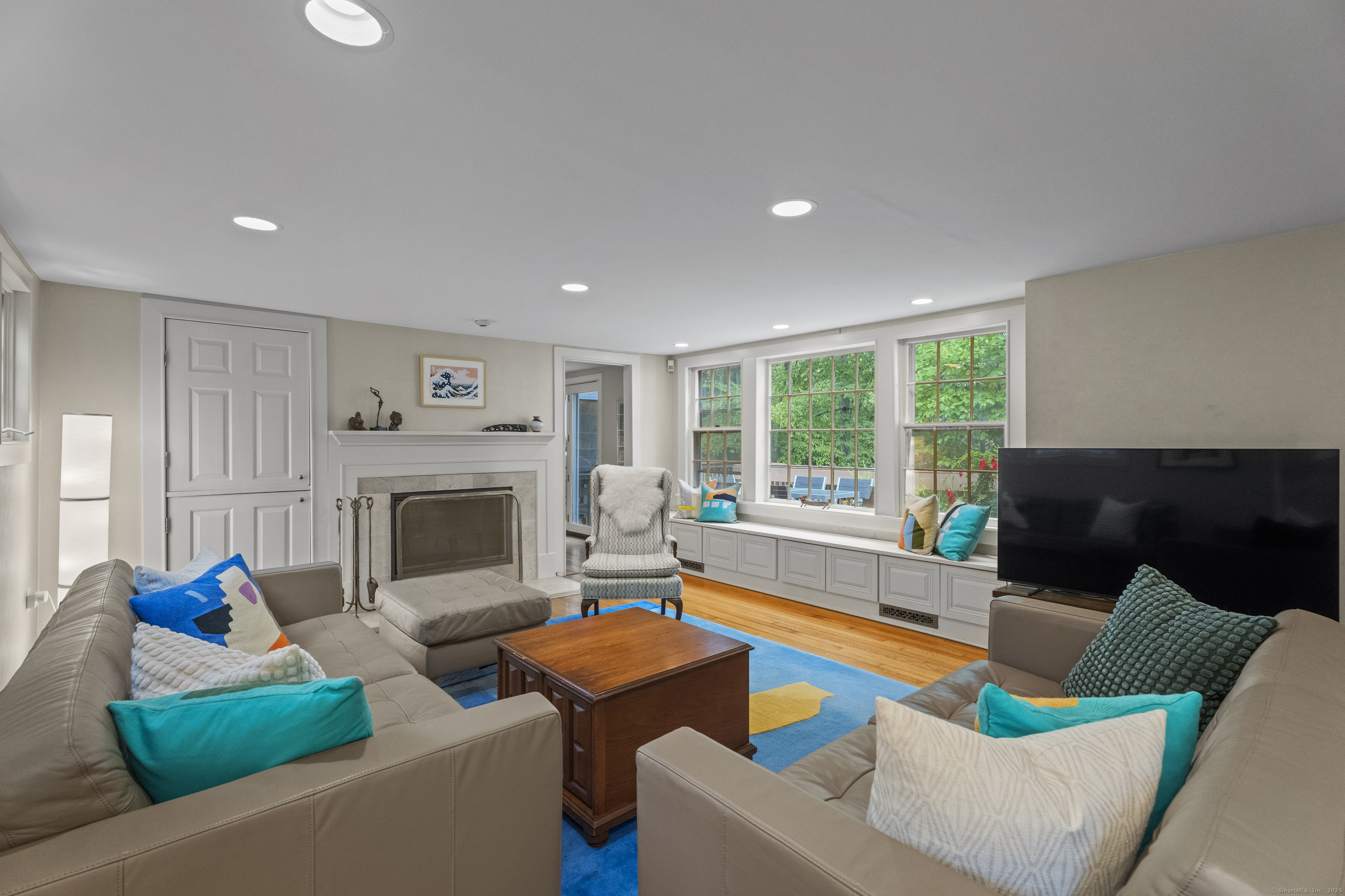 133 Blake Road Hamden, CT 06517 - Photo 4 of 40 a living room with furniture and a fireplace