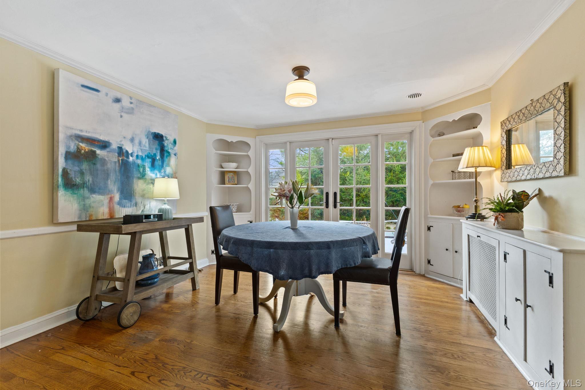 8 South Bedford Road Pound Ridge, NY 10576 - Photo 12 of 32 a view of a dining room with furniture window and wooden floor