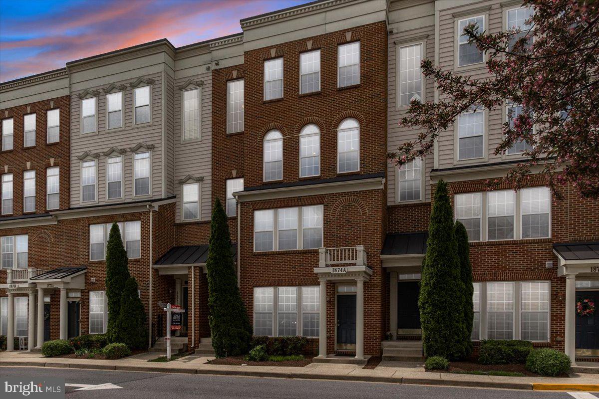 a front view of a building and a street