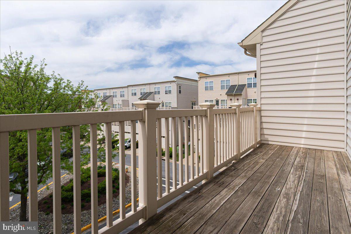 1874 Monocacy View Circle, Unit 28B Frederick, MD 21701 - Photo 12 of 35 a view of balcony with wooden floor
