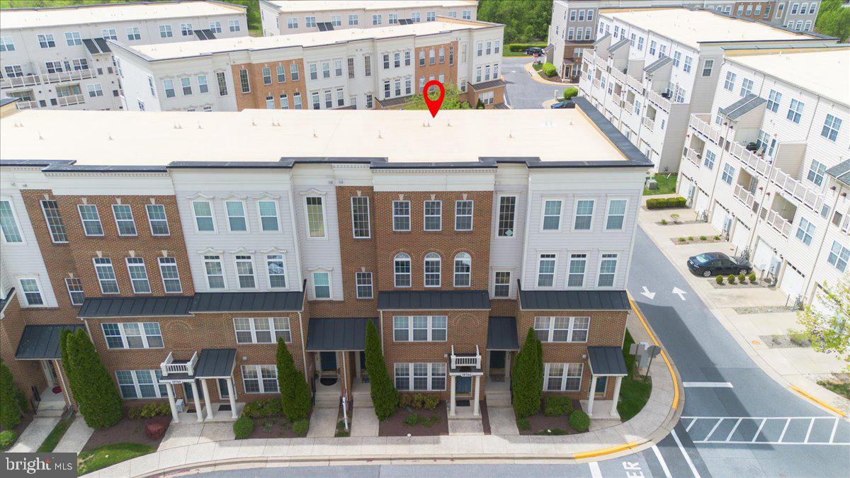 1874 Monocacy View Circle, Unit 28B Frederick, MD 21701 - Photo 25 of 35 a view of a building with a lot of windows