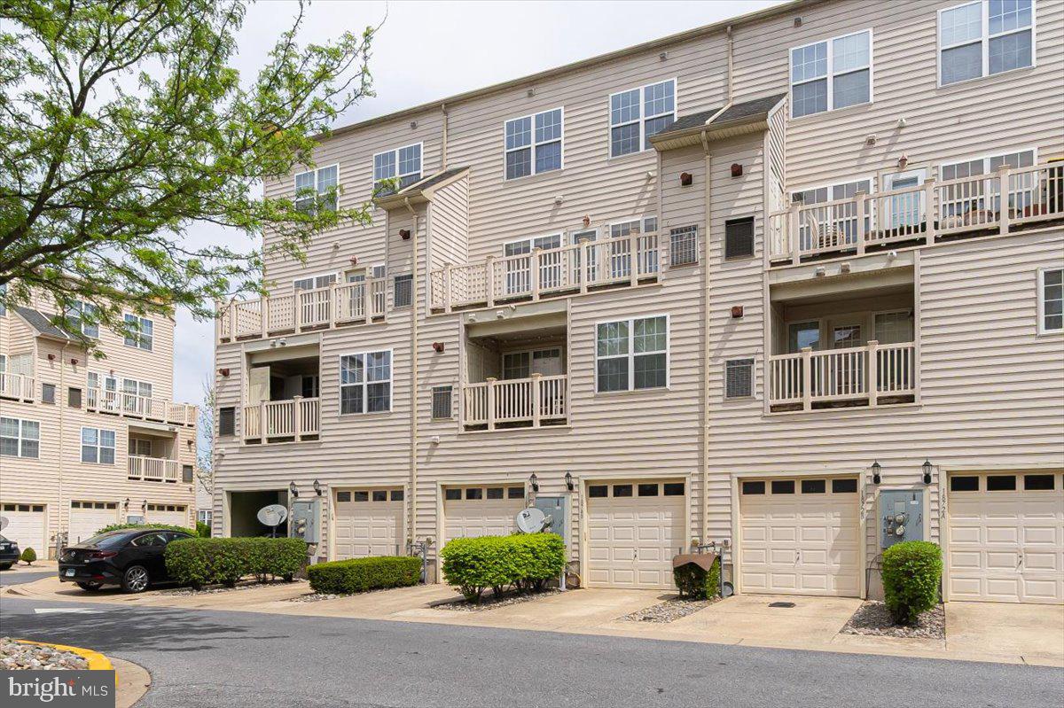 1874 Monocacy View Circle, Unit 28B Frederick, MD 21701 - Photo 26 of 35 a front view of a building with a road