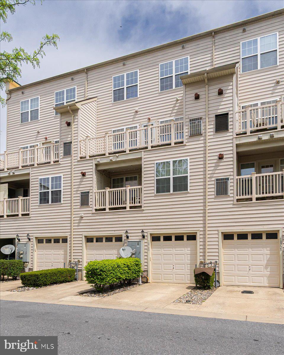 1874 Monocacy View Circle, Unit 28B Frederick, MD 21701 - Photo 27 of 35 a large building with a street