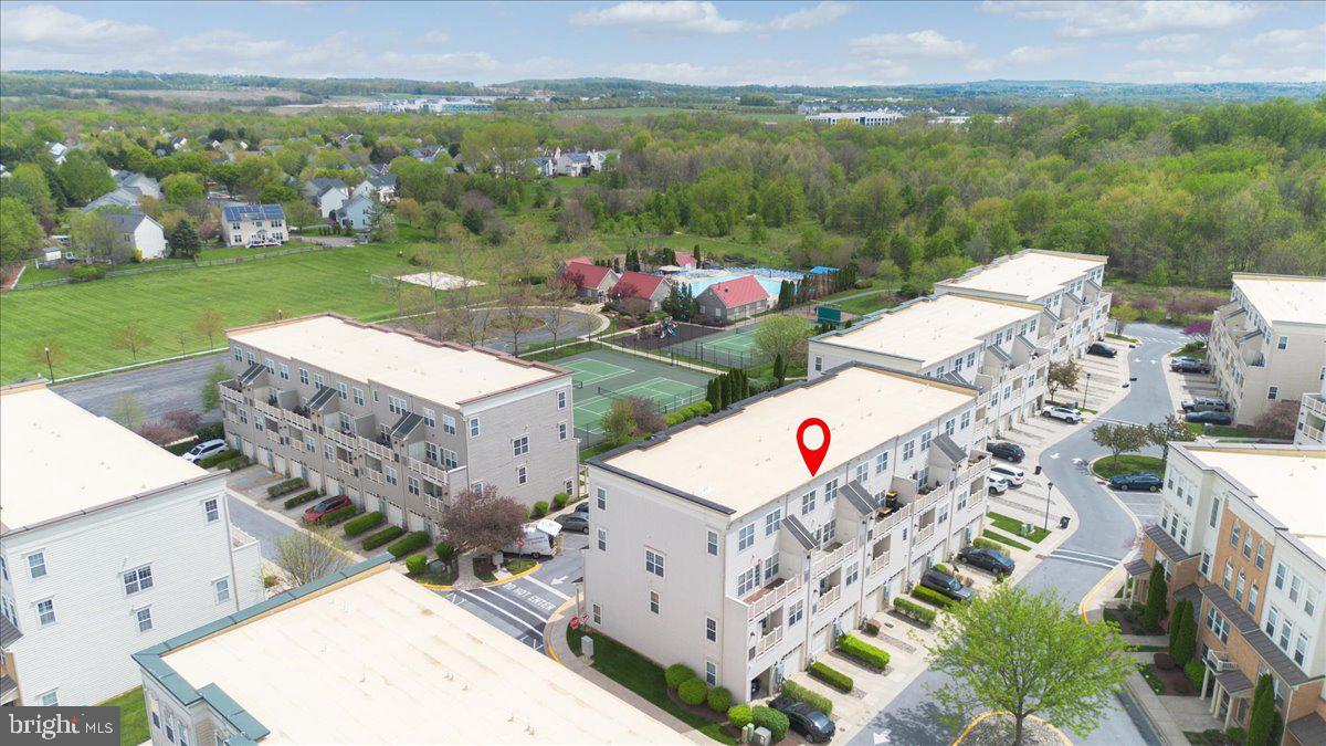 1874 Monocacy View Circle, Unit 28B Frederick, MD 21701 - Photo 30 of 35 a aerial view of a house with a garden and outdoor seating
