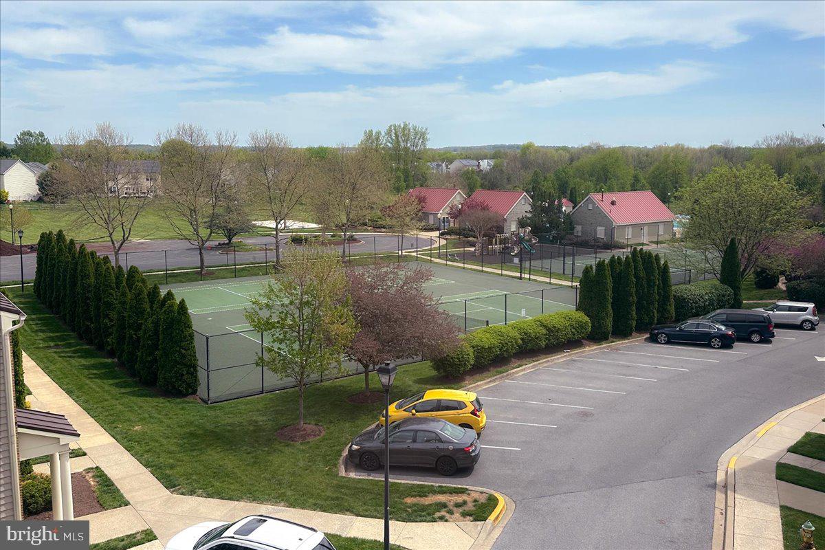 1874 Monocacy View Circle, Unit 28B Frederick, MD 21701 - Photo 32 of 35 a view of a lake with a yard