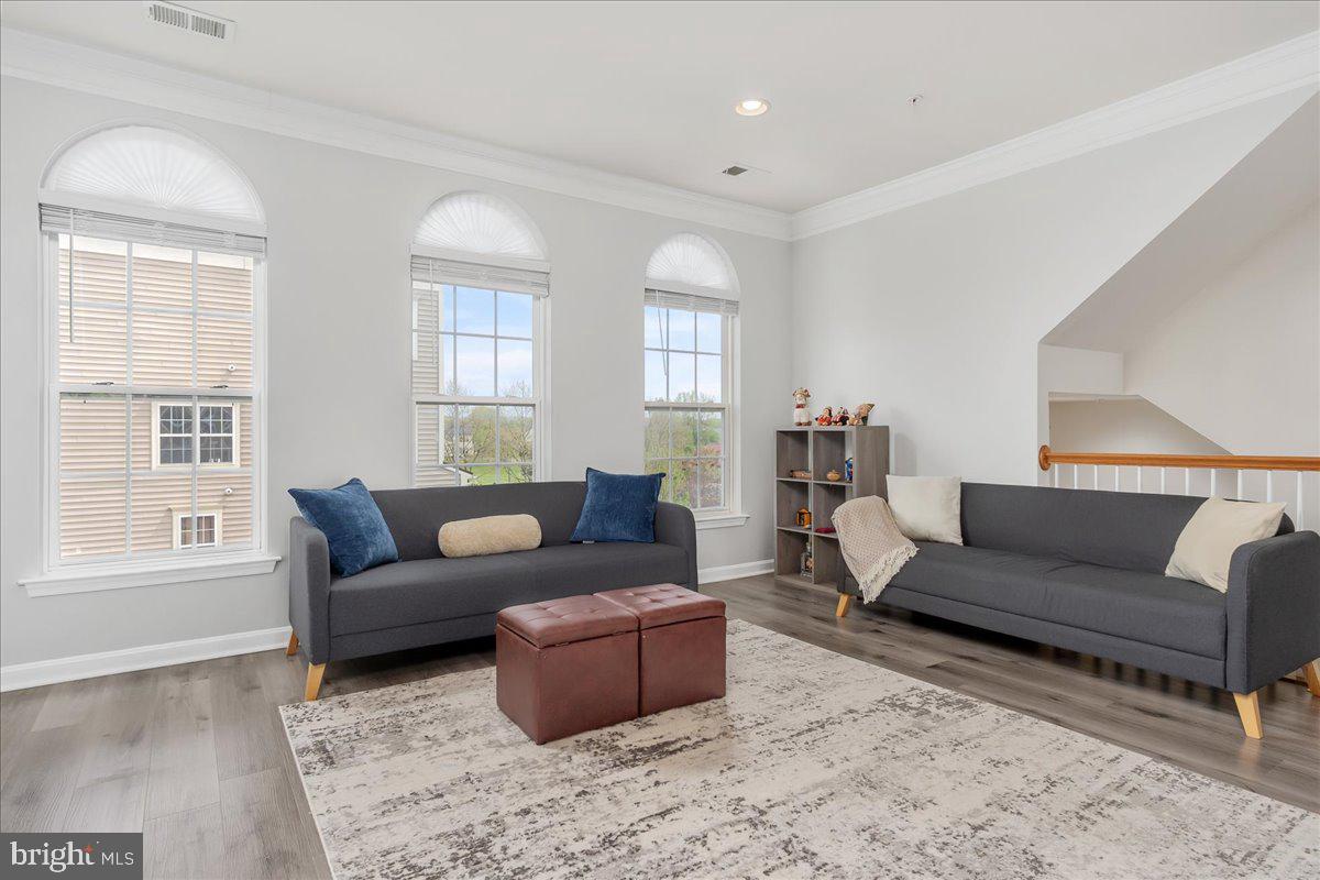 1874 Monocacy View Circle, Unit 28B Frederick, MD 21701 - Photo 4 of 35 a living room with furniture and a window