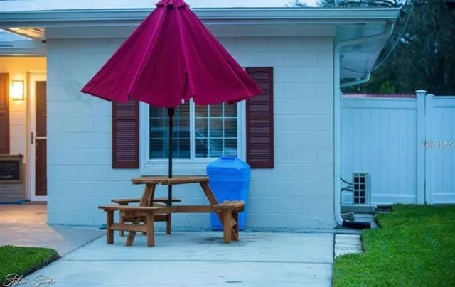 a bench is in front of a house