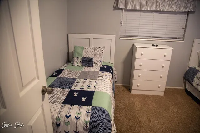 a view of bedroom with a bed