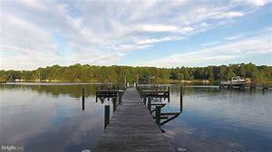 11431 Redlands Road Lusby, MD 20657 - Photo 2 of 6 a view of a lake with outdoor space