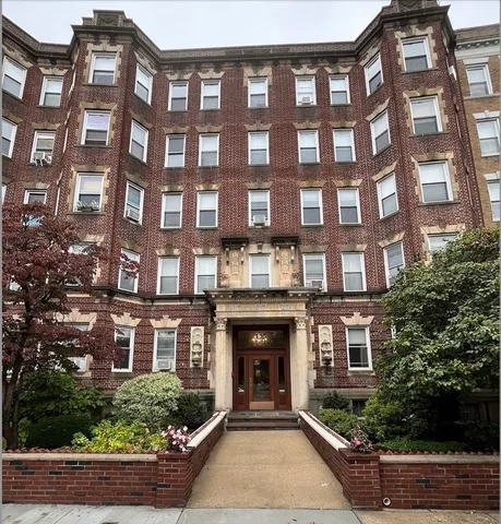 a front view of a multi story building