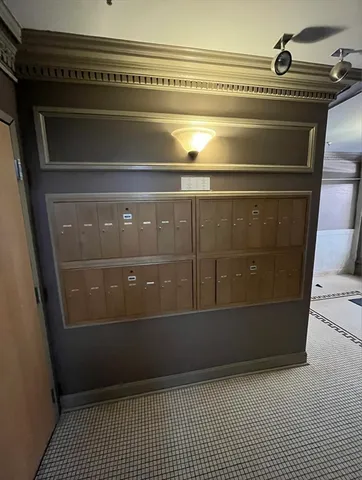 a view of a car parked in front of a building