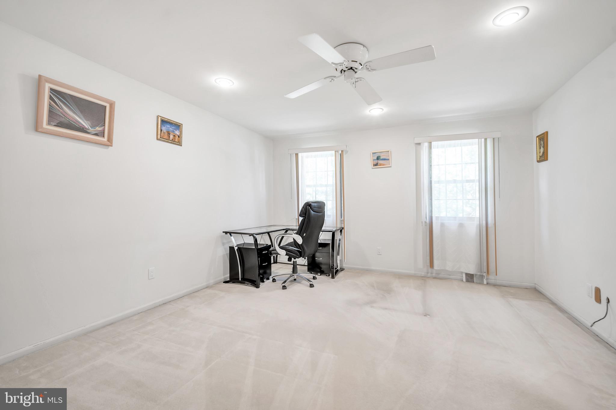 518 Pebble Ridge Court Langhorne, PA 19053 - Photo 14 of 31 a view of work space with chandelier fan and window