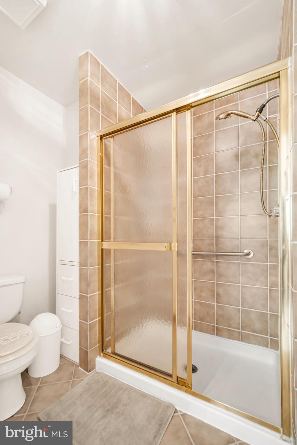 518 Pebble Ridge Court Langhorne, PA 19053 - Photo 17 of 31 a bathroom with a shower and a toilet