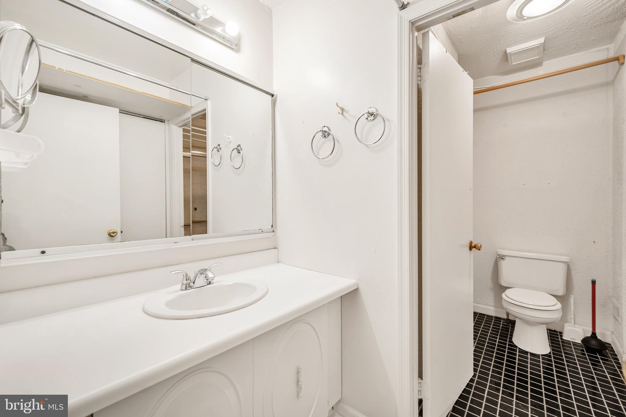 518 Pebble Ridge Court Langhorne, PA 19053 - Photo 19 of 31 a bathroom with a sink and a toilet