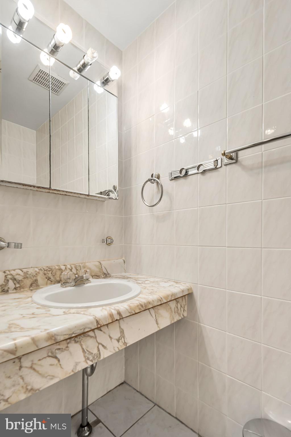 518 Pebble Ridge Court Langhorne, PA 19053 - Photo 25 of 31 a bathroom with a sink and a shower
