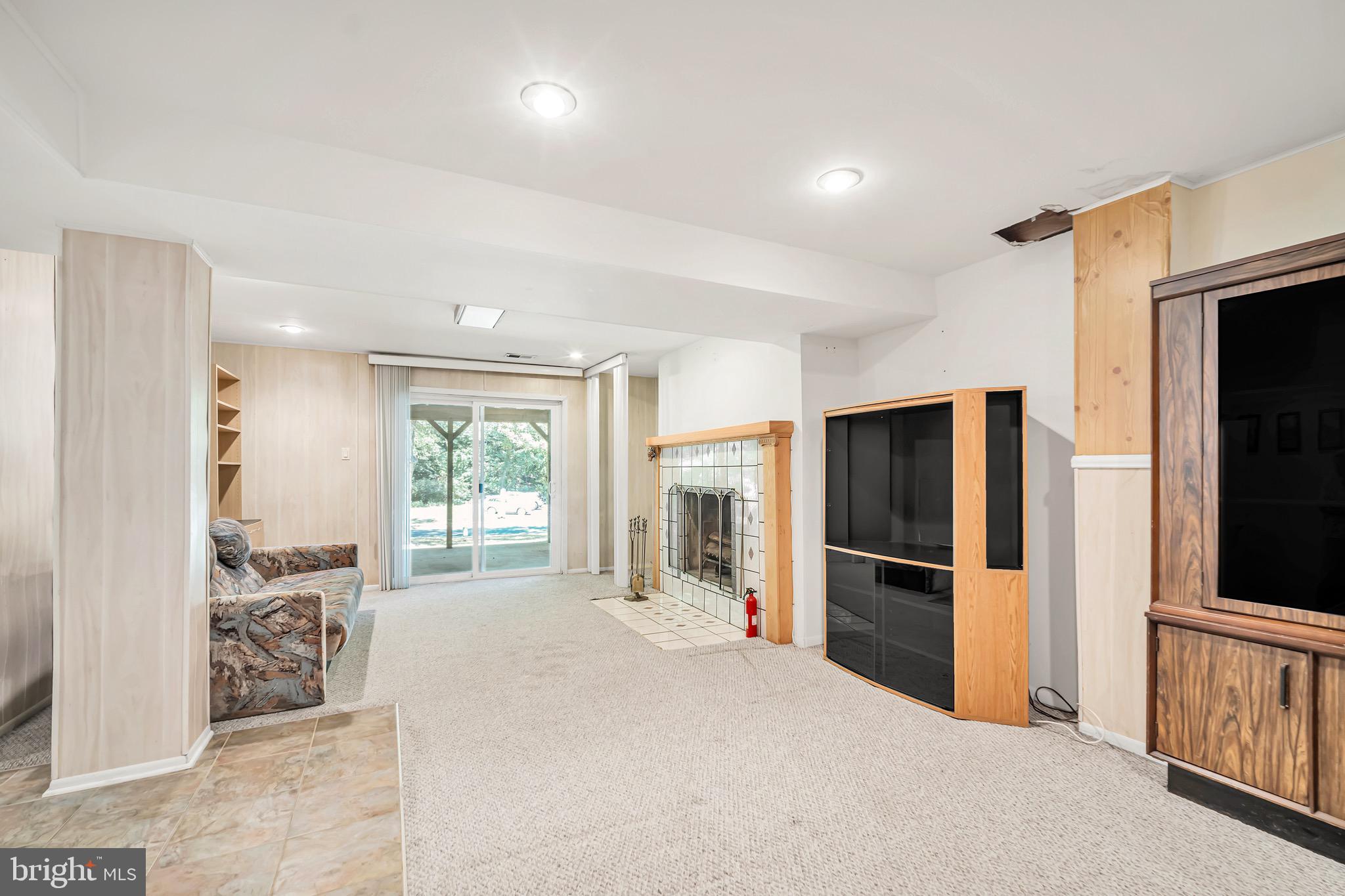 518 Pebble Ridge Court Langhorne, PA 19053 - Photo 26 of 31 a large bedroom with a large bed and a flat tv screen
