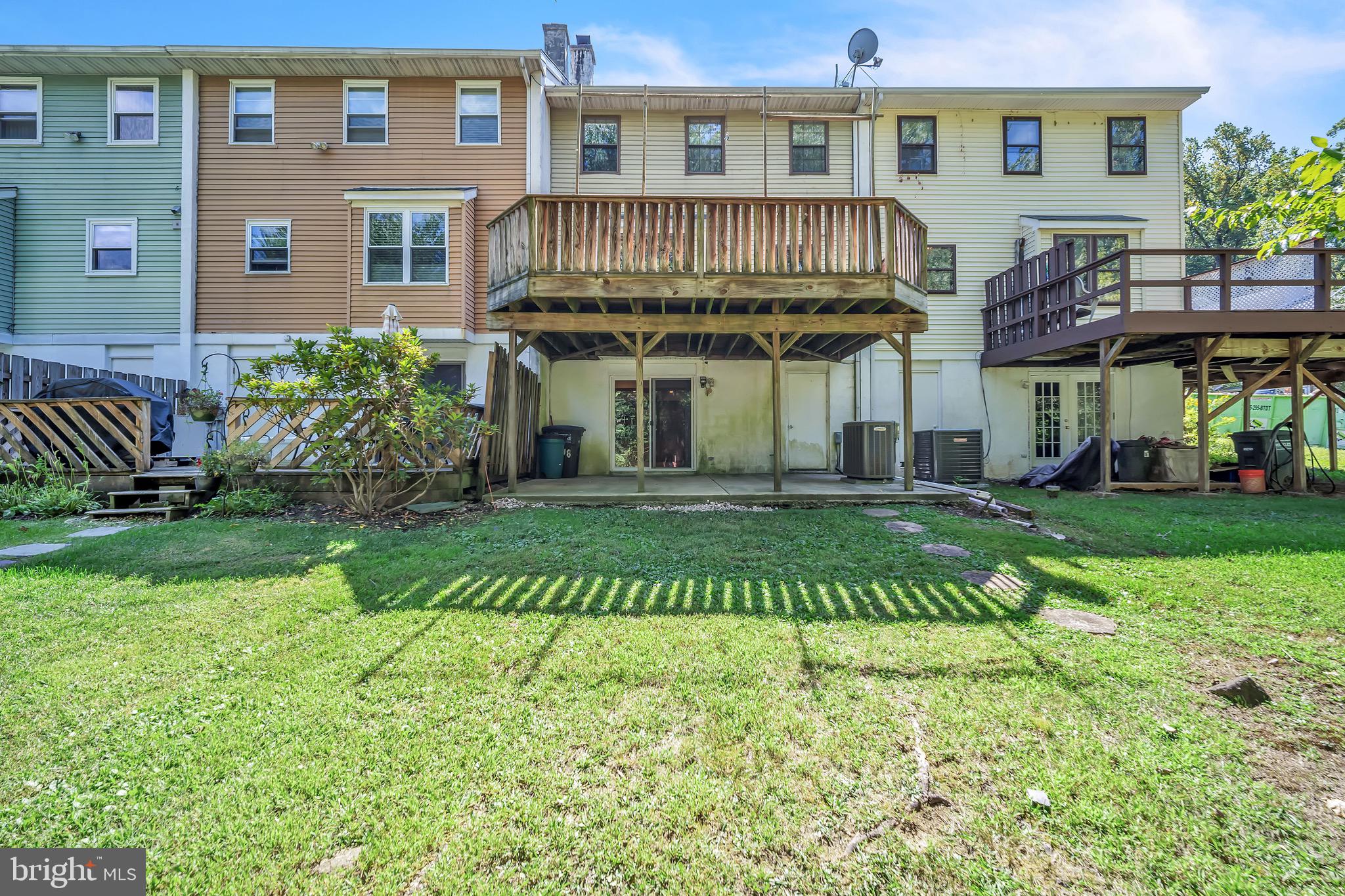 518 Pebble Ridge Court Langhorne, PA 19053 - Photo 29 of 31 a view of a big house with a big yard plants and large trees