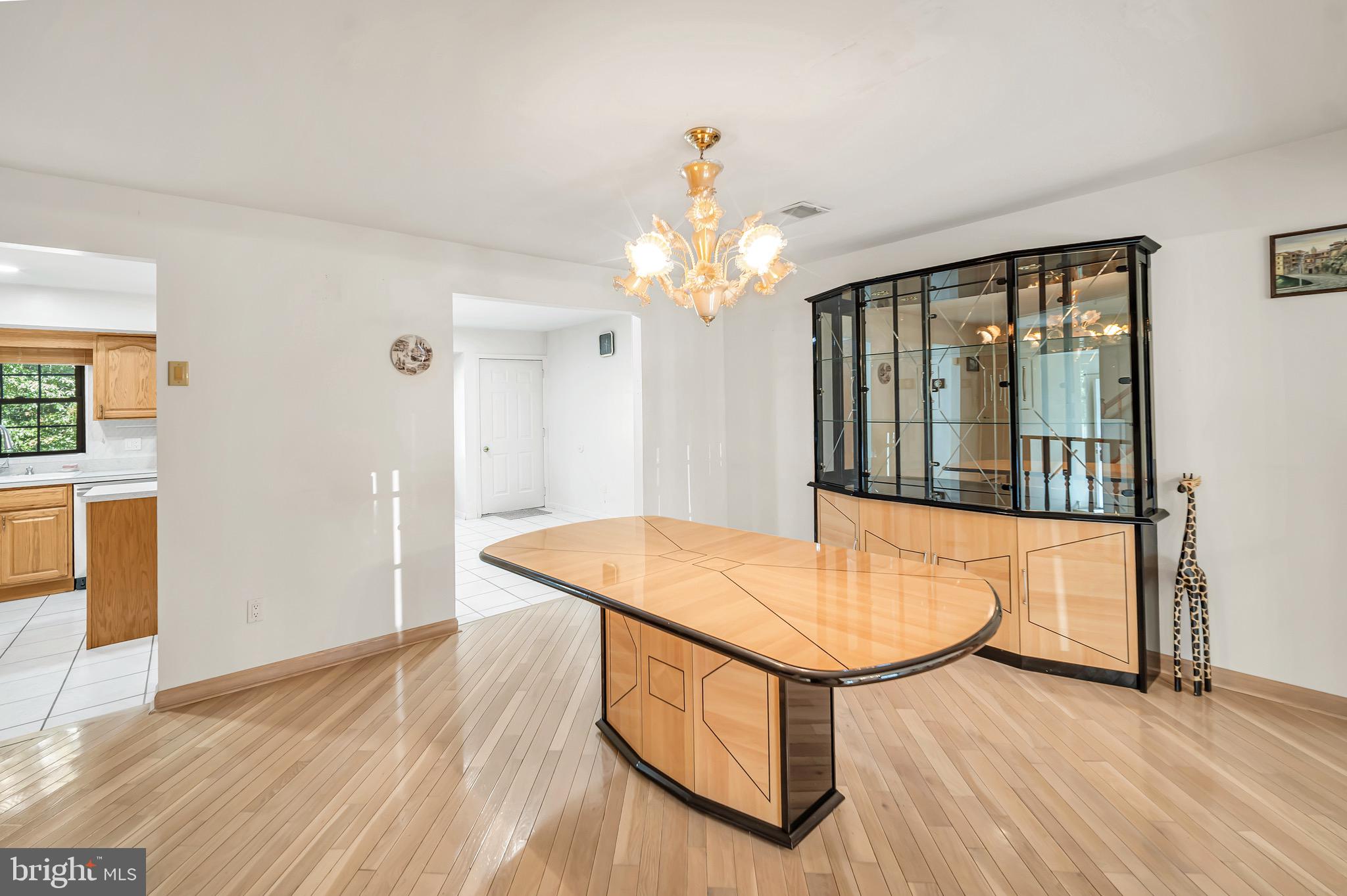 518 Pebble Ridge Court Langhorne, PA 19053 - Photo 6 of 31 wooden floor in an empty room with a window