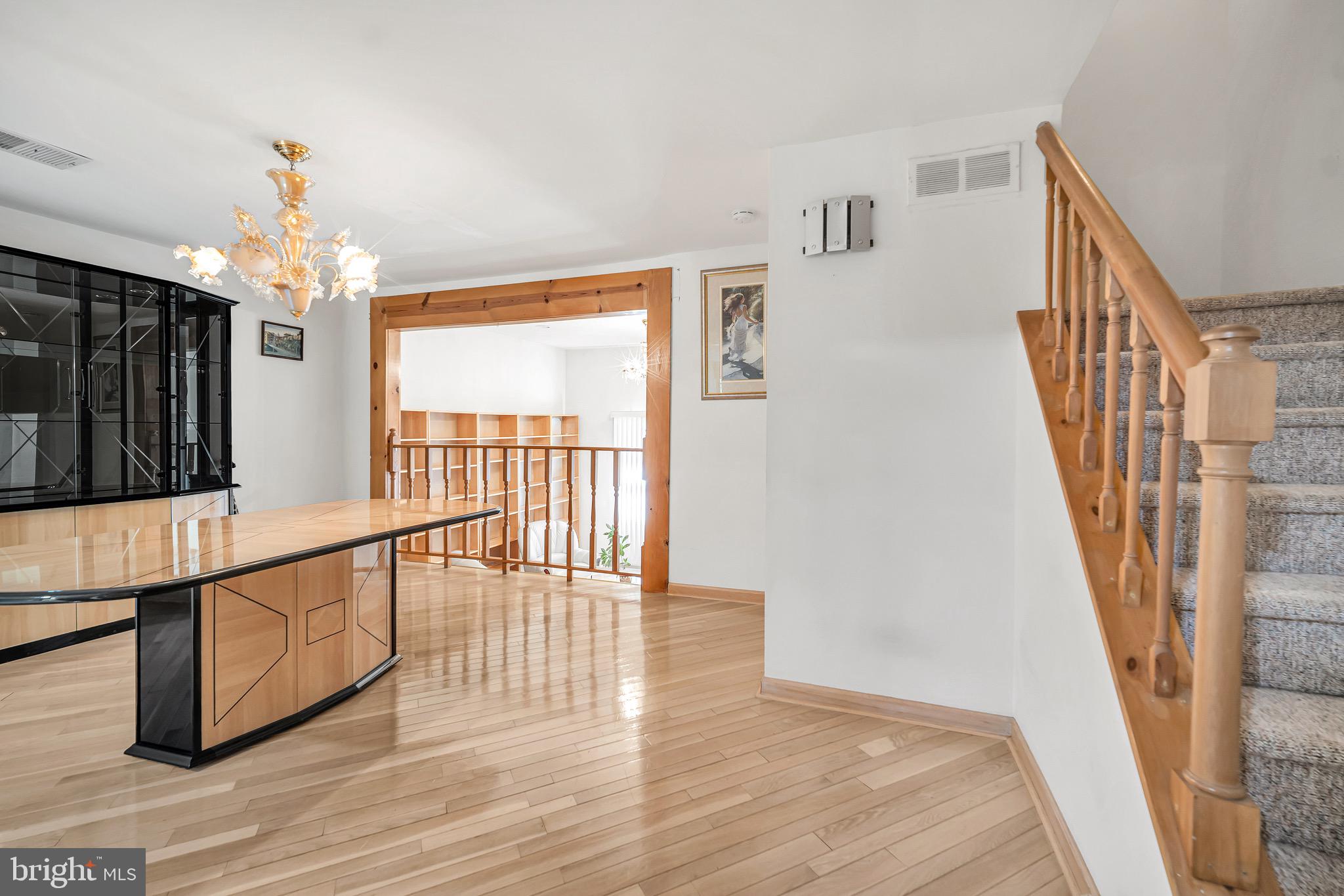 518 Pebble Ridge Court Langhorne, PA 19053 - Photo 8 of 31 a view of entryway and hall with wooden floor