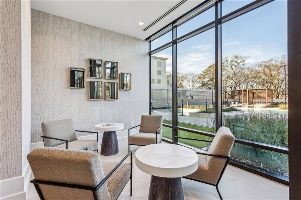 2520 Peachtree Road, Unit 602 Atlanta, GA 30305 - Photo 32 of 45 a dining room with furniture and a floor to ceiling window