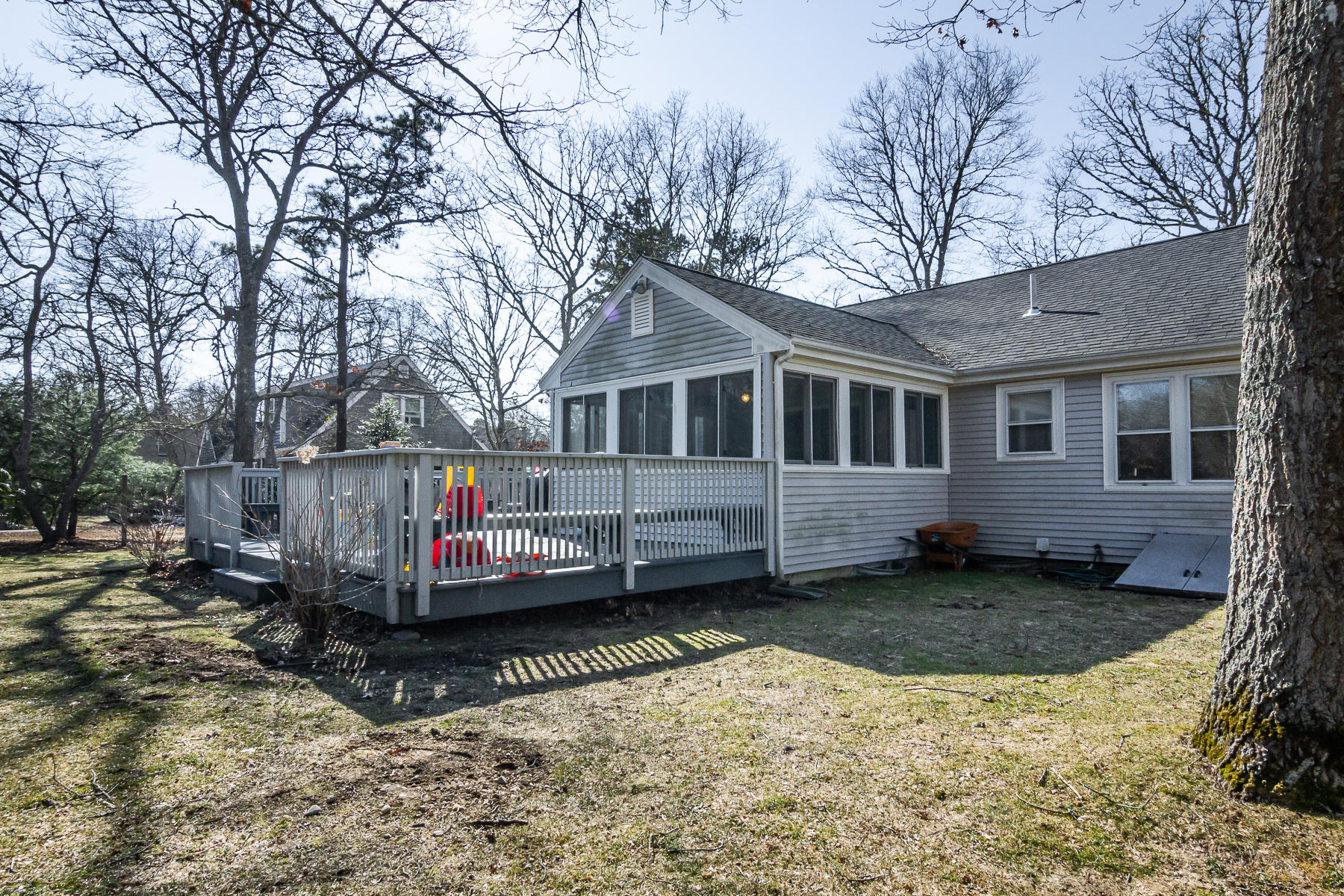 212 Skunknet Road Centerville, MA 02632 - Photo 8 of 45 a front view of a house with a yard