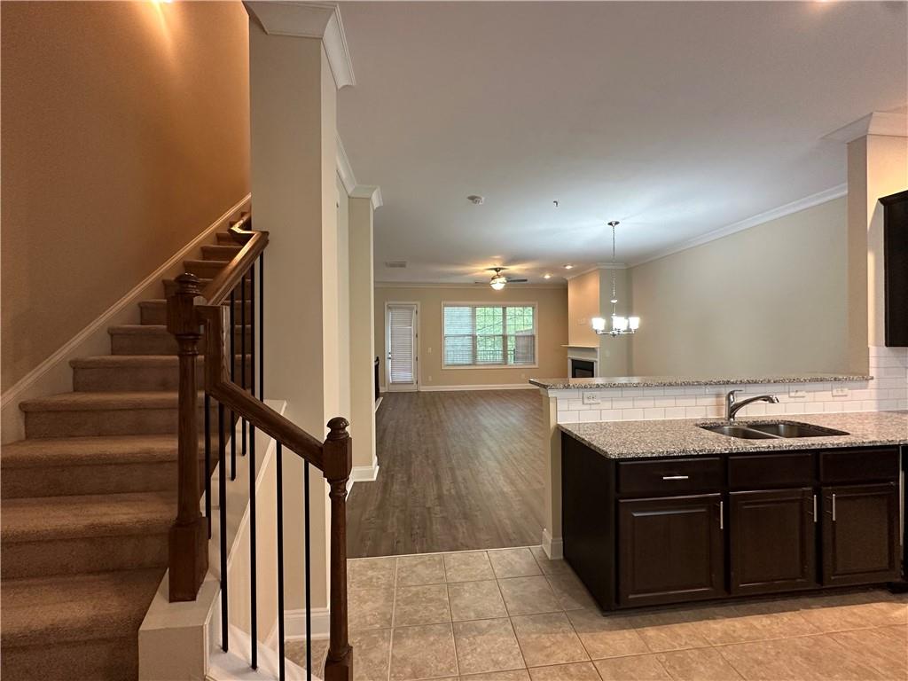 2417 Tenor Lane Alpharetta, GA 30009 - Photo 15 of 43 a kitchen with sink and mirror