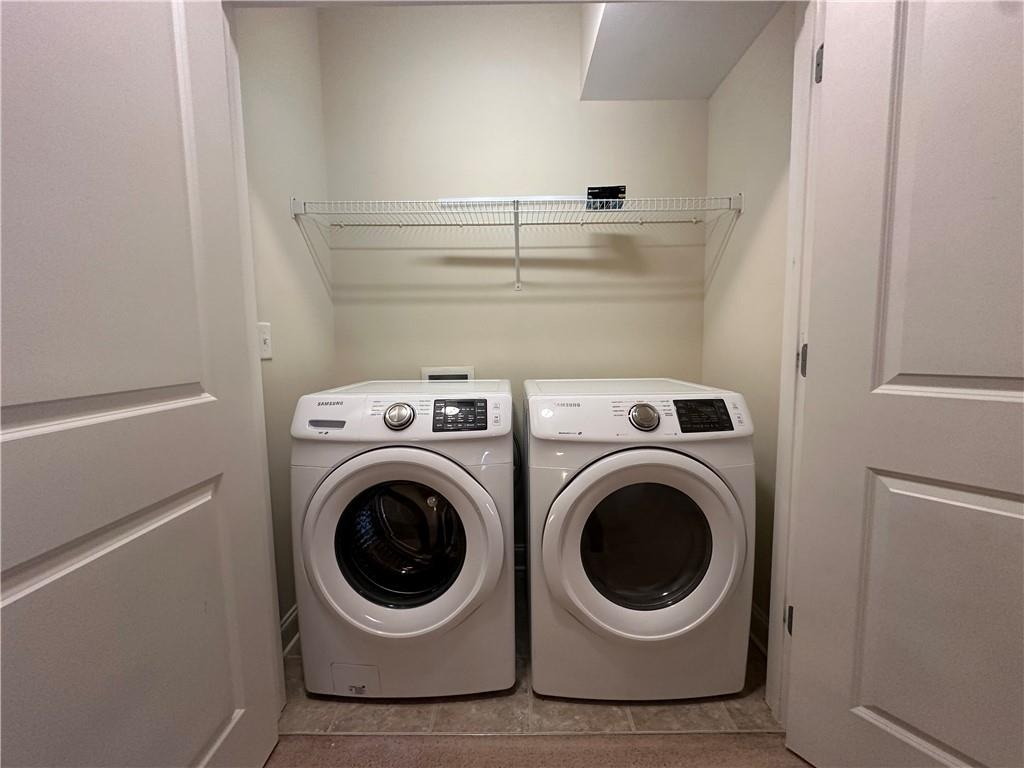 2417 Tenor Lane Alpharetta, GA 30009 - Photo 17 of 43 a utility room with dryer and washer