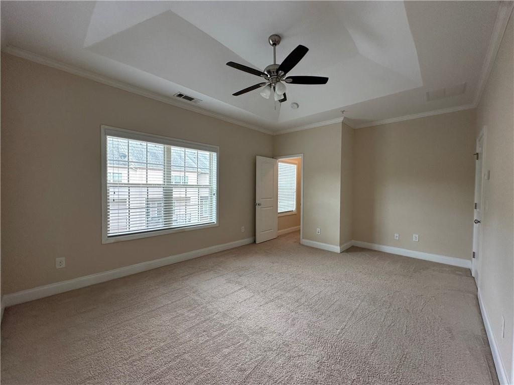 2417 Tenor Lane Alpharetta, GA 30009 - Photo 18 of 43 a view of a livingroom with a ceiling fan and window