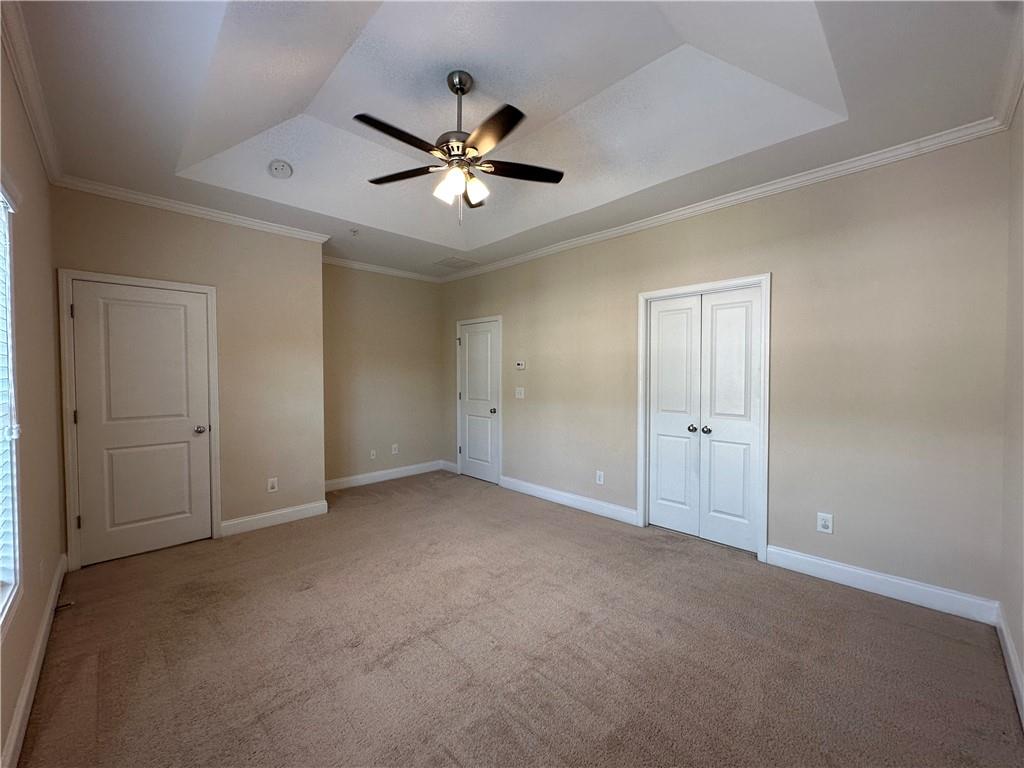 2417 Tenor Lane Alpharetta, GA 30009 - Photo 19 of 43 a view of an empty room with a ceiling fan