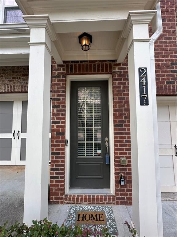 2417 Tenor Lane Alpharetta, GA 30009 - Photo 2 of 43 a view of front door of house