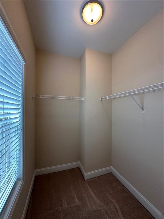 2417 Tenor Lane Alpharetta, GA 30009 - Photo 22 of 43 a view of a room with wooden floor and small window