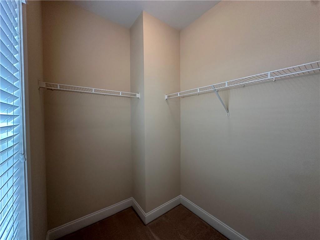 2417 Tenor Lane Alpharetta, GA 30009 - Photo 23 of 43 a empty walk in closet