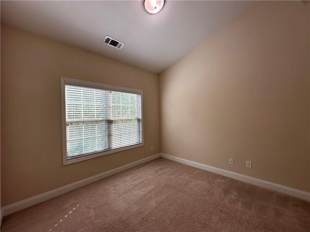 2417 Tenor Lane Alpharetta, GA 30009 - Photo 27 of 43 an empty room with a window