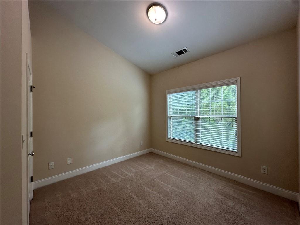 2417 Tenor Lane Alpharetta, GA 30009 - Photo 28 of 43 an empty room with a window