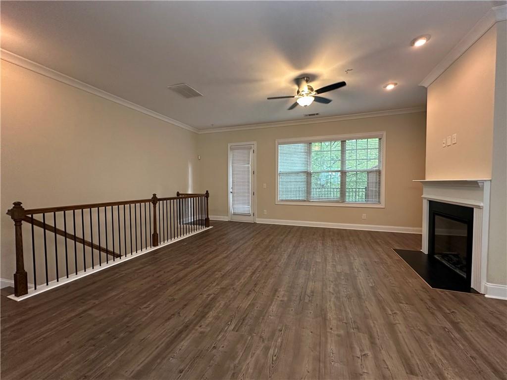 2417 Tenor Lane Alpharetta, GA 30009 - Photo 3 of 43 wooden floor in an empty room with a window