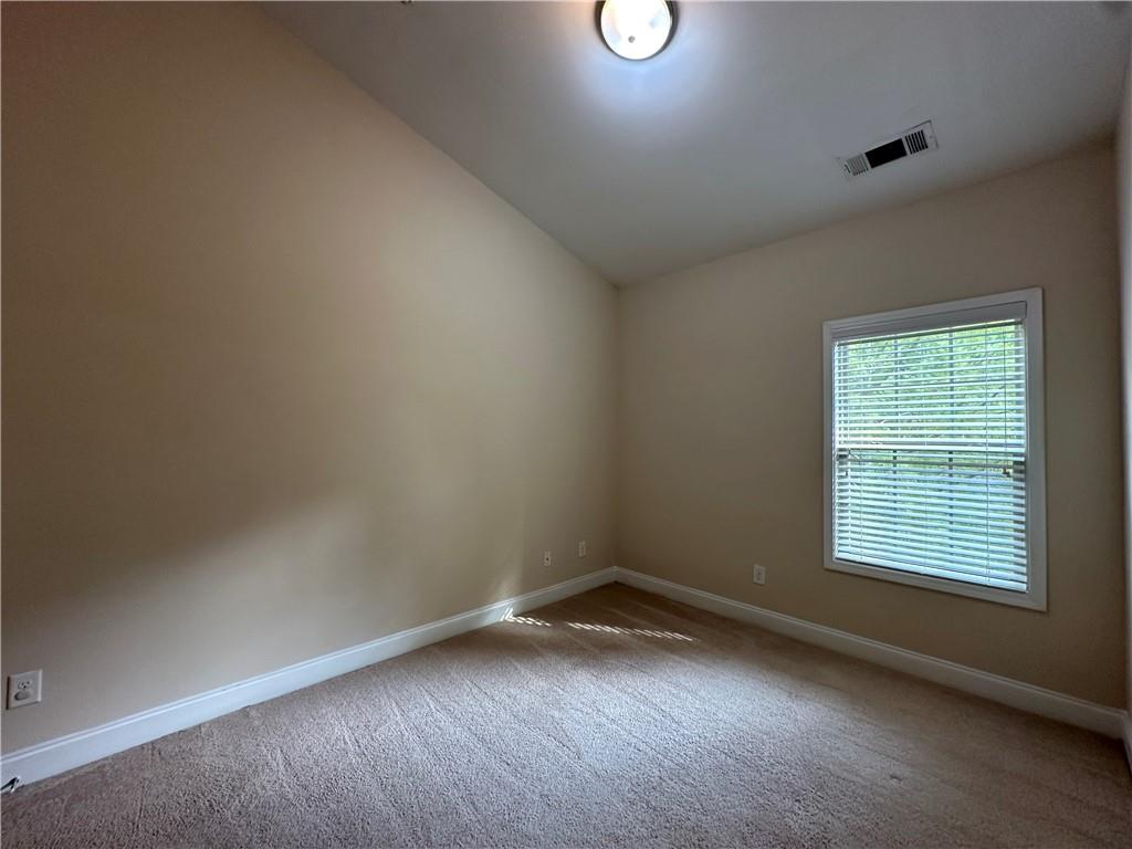 2417 Tenor Lane Alpharetta, GA 30009 - Photo 31 of 43 an empty room with a window