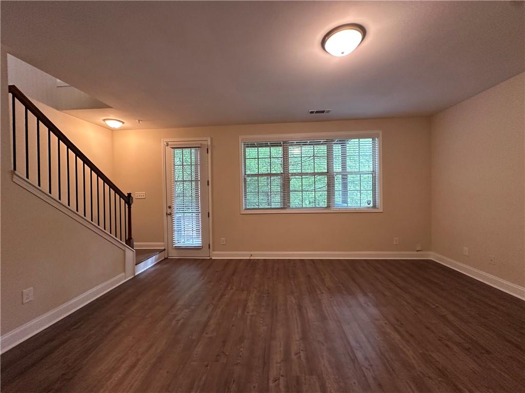 2417 Tenor Lane Alpharetta, GA 30009 - Photo 38 of 43 wooden floor in an empty room with a window