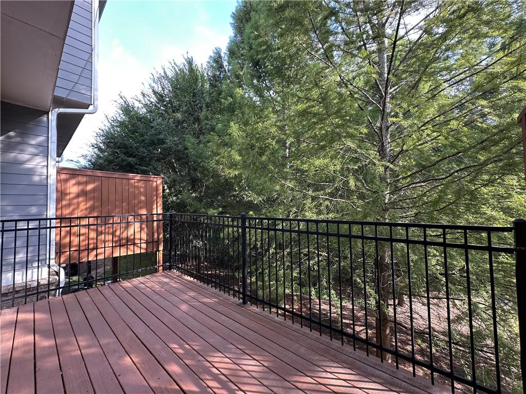 2417 Tenor Lane Alpharetta, GA 30009 - Photo 8 of 43 a view of balcony with wooden floor and fence