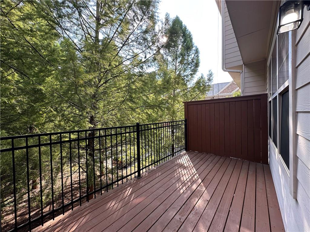 2417 Tenor Lane Alpharetta, GA 30009 - Photo 9 of 43 a view of balcony with wooden floor