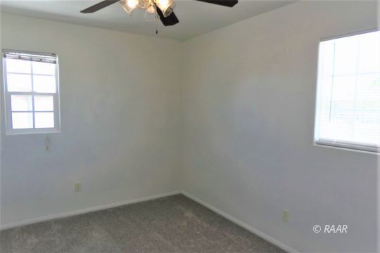 229 North Helena Street Ridgecrest, CA 93555 - Photo 21 of 32 an empty room with a window