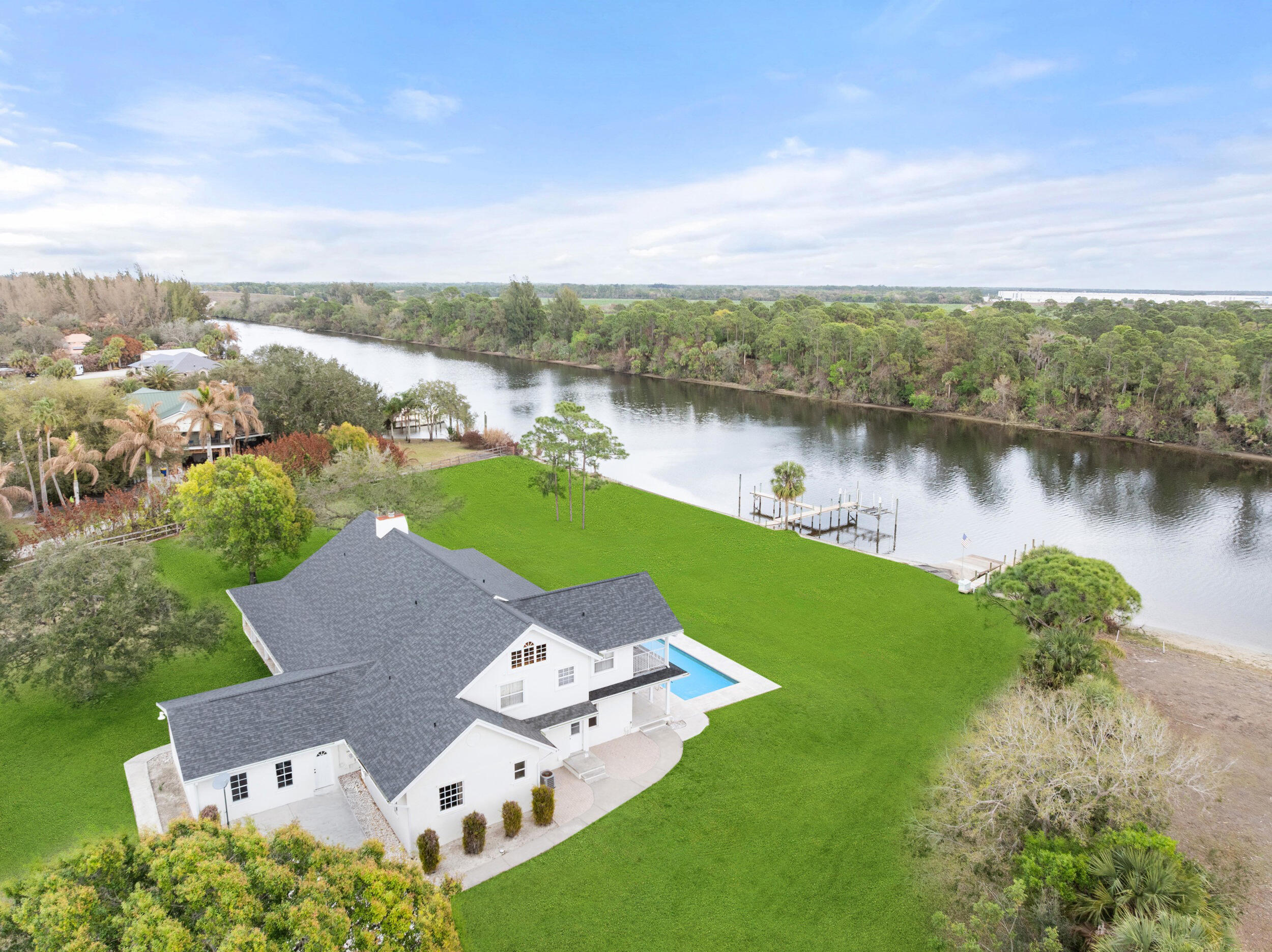 10125 Southwest Green Ridge Lane, Unit LANE Palm City, FL 34990 - Photo 3 of 84 56_dji_20260227040308_0171_d