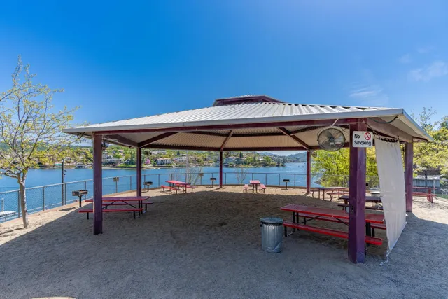 a view of backyard with sitting area