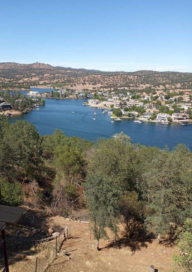 4983 Pueblo Trail Copperopolis, CA 95228 - Photo 2 of 23 an aerial view of residential house and lake view