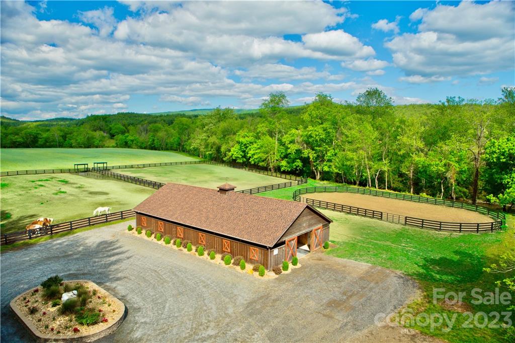 2032 Shadow Ridge Trail, Unit LOT G40 Lenoir, NC 28645 - Photo 17 of 25 a view of a swimming pool with a yard
